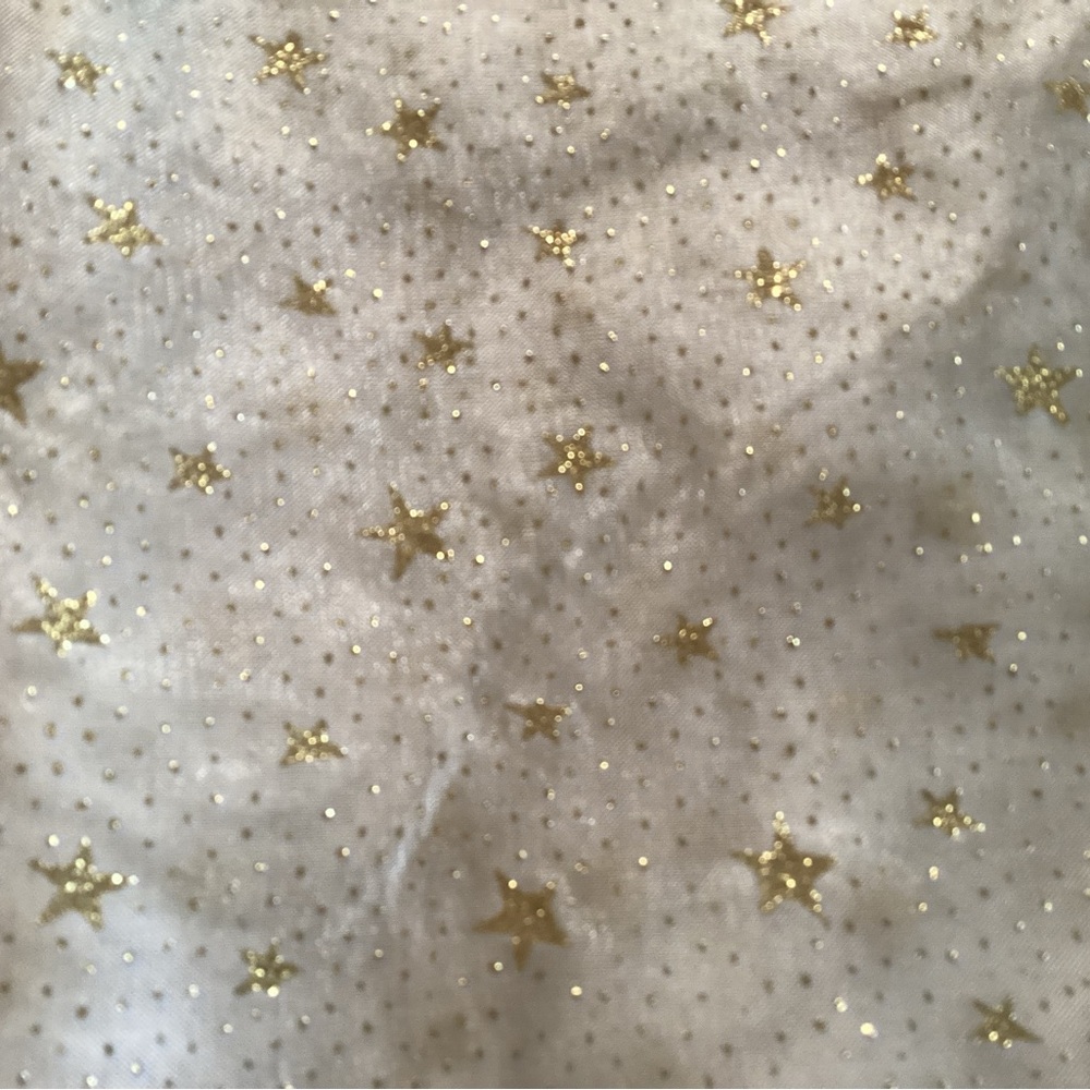 Gold Star Sheer Holiday Tablecloth with gold lame liner